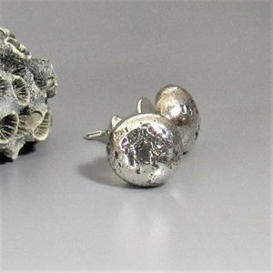 Lovely simplicity, rustic textured silver nugget stud earrings with oxidized finish. Chunky little nuggets make a great everyday pair for men or women. Wear with anything. Complete with post backs to hold them securely.Apx ¼ inch diameter.