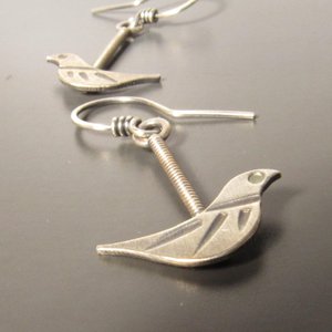 Sweet little everyday bird earrings crafted from 100 percent argentium sterling silver. Lightweight and beautiful details make for a great gift for the bird lover.almost 1.5 inches long and .75 inch at widest point.