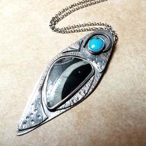 full photo of turquoise and fossil pendant by mocahete